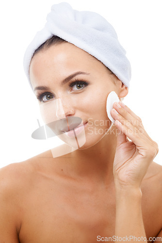 Image of Beauty, portrait or woman in studio with cotton pad on face, cosmetics or makeup cleaning product. Dermatology, remove or wellness for model with skincare, toner or facial glow on white background