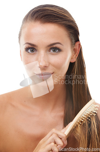Image of Hair care, brush and portrait of woman in a studio for natural, health and natural treatment. Beauty, wellness and young female person from Canada comb for hairstyle isolated by white background.
