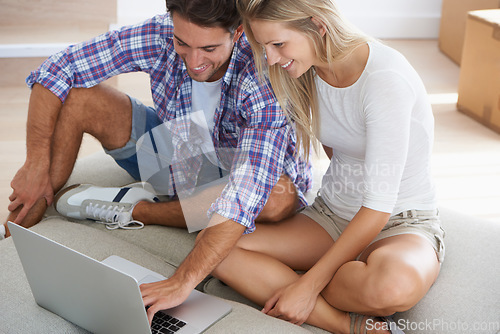 Image of Couple, smile and laptop on floor in home for movie, social media or web streaming with bonding and love. Technology, man or woman on ground with computer pc for internet scroll and tv show for care