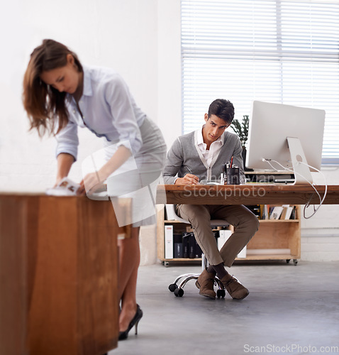 Image of Affair, infidelity or sexual harassment with business man by desk at work, looking at bum of colleague. Computer, receptionist or temptation and young employee in office with sexy woman coworker