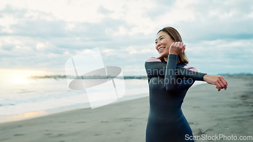 Image of Smile, beach and woman with happiness, stretching and vacation with getaway trip, seaside and training. Person, Japan and girl with ocean, waves and exercise with journey, muscle and wellness