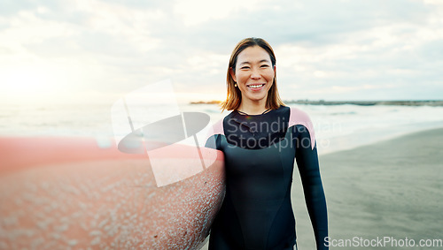 Image of Portrait, woman and smile for surfing at beach, sea and ocean for summer holiday, travel and adventure. Happy Japanese surfer with surfboard for water sports, freedom and relax for tropical vacation