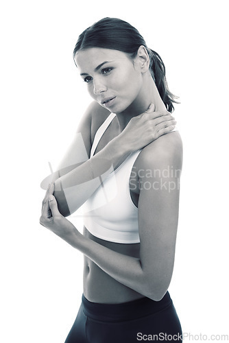 Image of Sports, injury and woman massage neck pain from exercise or workout in white background and studio. Stretching, shoulder and person with ache or hurt from accident and self care medical treatment