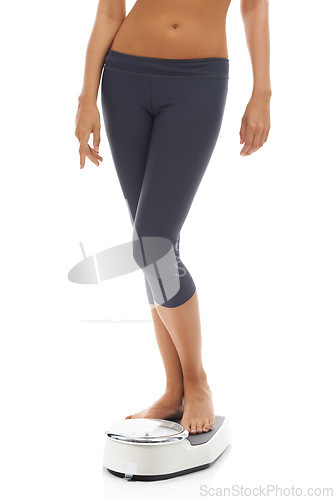 Image of Woman, lose weight and feet on scale to check results in white background, mockup and studio. Fitness, progress and person with measurement for health, wellness and diet for goals or slim body