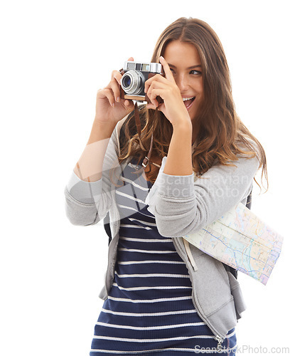 Image of Photography, travel and young woman in studio working for photoshoot with camera. Tourist, creative and photographer sightseeing with map on vacation, holiday or weekend trip by white background.