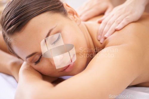Image of Woman, face and massage at spa, shoulders and hands on masseur for aromatherapy and healing with wellness. Calm, beauty and skincare, body care and health, holistic treatment for zen or stress relief