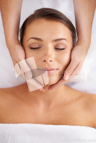 Image of Woman, facial and massage at spa from above for beauty, skincare treatment and healing at cosmetics salon. Face of calm client relax at wellness resort for reiki, break and peaceful holistic therapy