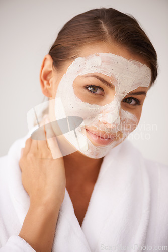 Image of Facial, portrait and woman with beauty and skincare, dermatology and spa treatment on white background. Healthy skin, wellness and face mask with cosmetics, self care and smile with moisturizer