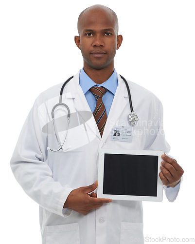 Image of Doctor, portrait and space on tablet screen in studio for advertising medical information, newsletter or telehealth feedback on white background. Black man, healthcare worker and digital presentation