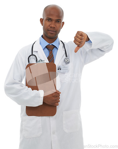 Image of Studio, black man and portrait of doctor with thumbs down for bad medical results, medicine report or disagreement vote. Clipboard, no emoji icon or surgeon with negative feedback on white background