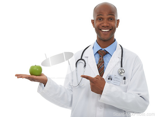 Image of Portrait, black man and doctor point at apple presentation for weight loss diet, nutrition or antioxidants benefits. Studio food, palm and African dietician with fresh fruits on white background