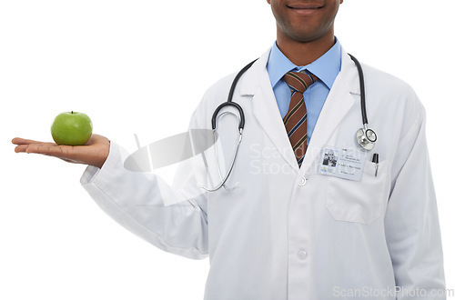 Image of Apple, doctor and studio person with palm gesture for wellness diet, healthcare nutrition or vitamin c benefits. Organic fruits, vegan food and nurse with health recommendation on white background