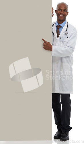 Image of Placard, black man and portrait of doctor point at poster mockup, hospital services or health information. Studio space, cardboard banner and healthcare worker for medical support on white background