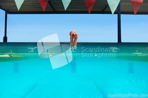 Image of Sports, dive or athlete in swimming pool to start fitness training or cardio workout for development. Event performance, person or swimmer ready for diving exercise, championship and race at gala