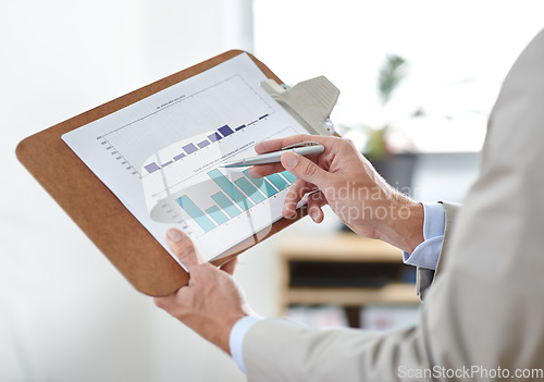 Image of Business hands, graphs and charts documents for data analysis, financial report and increase in revenue or profit. Professional person or auditor for account inspection with statistics on a clipboard