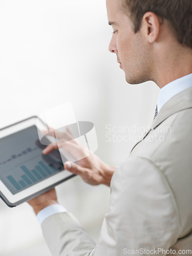 Image of Business man, tablet screen and graphs, charts or data analysis for financial report, increase in revenue or profit. Professional trader or auditor with account management and digital statistics