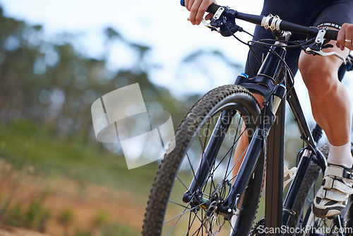 Image of Hands, bicycle and gear in nature for cycling adventure on off road terrain for extreme sport, performance or cardio. Person, fingers and shifter on mountain gravel or racing, competition or training