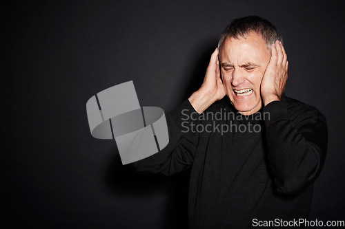 Image of Frustrated mature man in studio with stress, anxiety and dark fashion style on mockup space. Anger, fear and senior person isolated on black background with headache, mind and mental health burnout