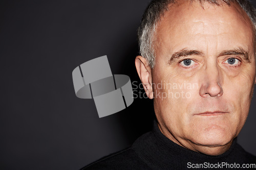 Image of Portrait of mature man in studio with serious face, confidence and wise in dark space. Pride, relax and senior businessman ceo isolated on black background with expert knowledge, mockup and wisdom.