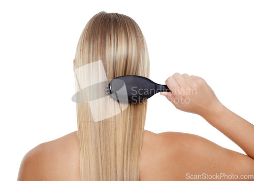 Image of Woman, back and brushing hair for grooming, texture or salon treatment on a white studio background. Rear view of female person, model or blonde with brush for haircare, keratin or shine on mockup