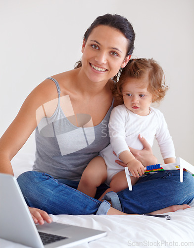 Image of Portrait, baby and happy mother on laptop in bedroom for remote work, learning or education in home. Freelancer parent, computer and kid playing with abacus, care and toddler together with family