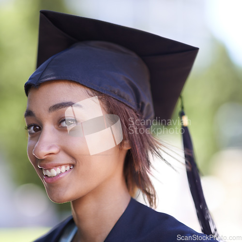 Image of Woman, portrait with graduate and achievement with education, cap and gown for ceremony outdoor. College, smile and graduation event for academic success, higher learning and certification with pride