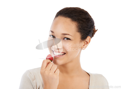 Image of Portrait, woman and eating strawberry in studio for healthy detox, vegan diet and nutrition on white background. Happy model, red berries and sustainable benefits of food, vitamin c and sweet fruits