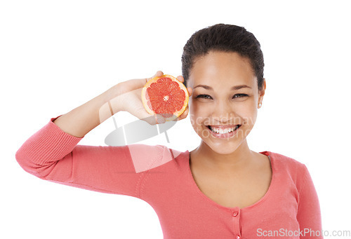 Image of Portrait, woman and smile with grapefruit for healthy detox, vegan diet or eco nutrition in studio on white background. Happy model, fruits and sustainable benefits of vitamin c, snack or citrus food