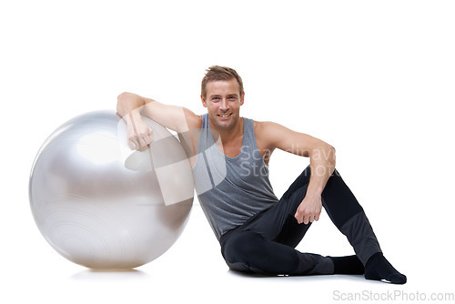 Image of Relax, fitness and medicine ball with portrait of man in studio for exercise, yoga and aerobics workout. Health, gym and pilates with person on white background for wellness, commitment and vitality