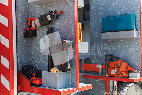 Image of Close-up of essential firefighting equipment on a modern firetruck, showcasing tools and gear ready for emergency response to hazardous fire situations