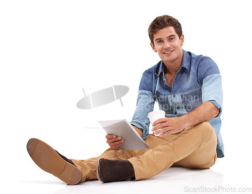 Image of Tablet, mockup and portrait of happy man on studio floor with social media, chat or scroll on white background. Space, face or male student with digital, app or search, streaming or upskill training