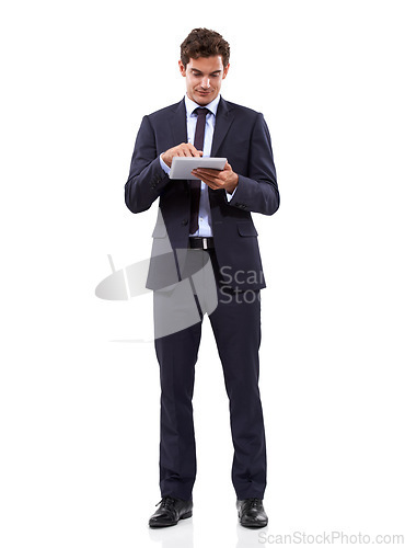 Image of Business man, studio and typing on tablet in online research, stock market investment or trading software. Professional trader or corporate analyst scroll on digital technology on a white background