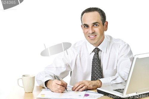 Image of Office worker studying reports