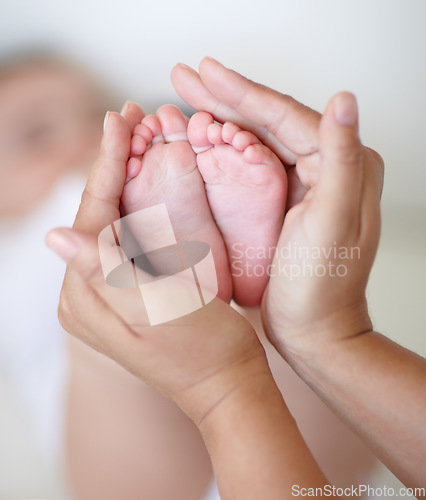 Image of Love, mother and hands with newborn or feet for development, nurture and bonding in nursery of apartment. Family, woman or baby toes with trust, support or care for relationship or motherhood in home