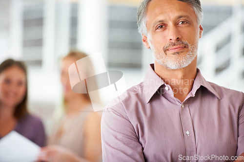 Image of Office, leadership and portrait of business man with team for collaboration, confidence and pride. Corporate, company and happy worker with staff for meeting, planning and management in workplace