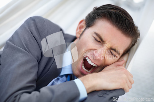 Image of Sleeping, yawn and tired business man in a hammock with low energy, resting or break outdoor. Sleepy, face and young male entrepreneur outside with fatigue, nap or travel burnout, lazy and dreaming