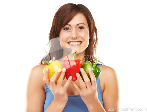 Image of Vegetables, bell peppers and portrait of woman on a white background for healthy eating, nutrition and diet. Happy, food and face of isolated person for wellness, vitamins and organic meal in studio