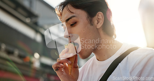 Image of Ice cream, travel and man in Japanese city on vacation, holiday and adventure in Yokohama town. Summer, weekend trip and person with dessert, sweet snack and cone in street for tourism destination