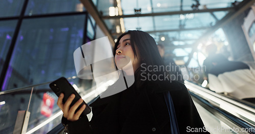 Image of Japanese, woman on escalator and phone, travel and commute, communication with social media and adventure. Text, email and online chat with connectivity, subway or airport with mobile app in Japan