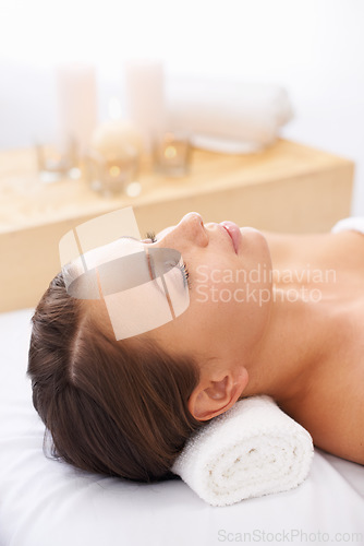 Image of Woman, spa and relax for wellness and face, self care with aromatherapy or alternative medicine for peace and calm. Massage, luxury and zen with holistic healing and bodycare for stress relief