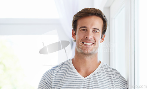 Image of Man, portrait and smile confidence in home or relax weekend, morning or holiday. Male person, face and casual in apartment living room in summer in good mood or calm positivity, rest or stress relief