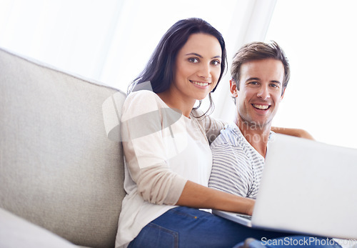 Image of Couple, laptop and portrait on sofa with care, living room and wellness in marriage for bonding together. Face , woman and man for happy in committed relationship, relax weekend and love in apartment