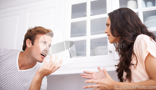 Image of Couple, stress and fight, angry and conflict with crisis in life, mistake or marriage fail with anxiety at home. Frustrated people arguing in kitchen, cheating or problem with risk of divorce