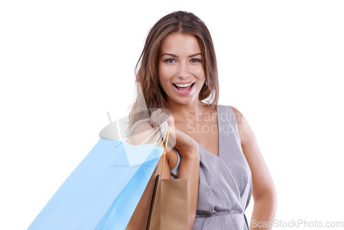 Image of Smile, portrait and happy woman with shopping bag in studio for retail sales on white background. Wow, deal and face of female model with fashion discount, emoji or store, market or mall promotion