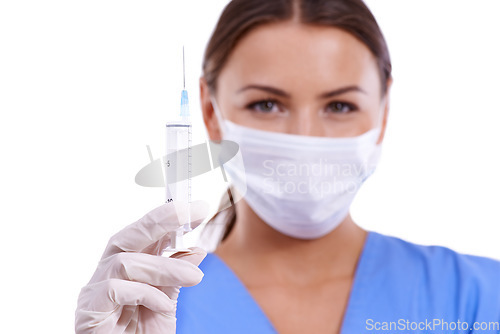 Image of Woman, portrait and doctor with face mask or needle for protection, health and safety on a white studio background. Female person, surgeon or medical nurse with syringe for vaccination or anesthetic