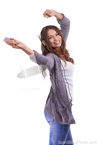 Image of Happy woman, portrait and headphones dancing to podcast or music on a white studio background. Face of young female person smile with radio or audio player for sound track, podcast or streaming