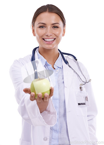 Image of Doctor, woman and portrait with apple in studio for vitamin c benefits, healthcare and detox on white background. Happy dietician, nutritionist and medical worker with fruits, healthy food and fiber