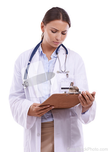 Image of Woman, doctor and reading policy on clipboard for healthcare on a white studio background. Face of female person, surgeon or medical nurse looking at results, signup or life insurance in medicare