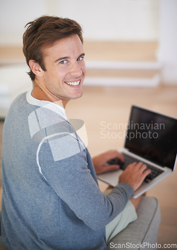 Image of Man, portrait and laptop brainstorming or home as remote copywriter for problem solving, solution or research. Male person, face and happy web browsing for online blog connection, email or internet