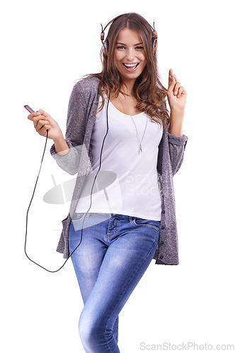 Image of Happy woman, portrait and headphones listening to music or dancing on a white studio background. Face of young female person smile with radio or audio player for sound track, podcast or streaming